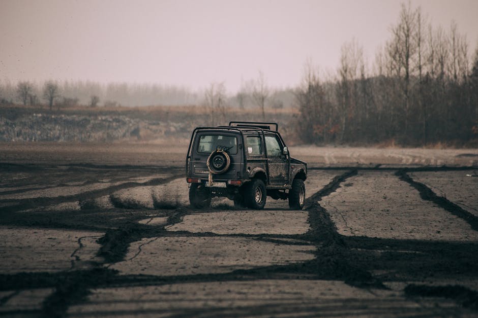SUV in a cracked dry field